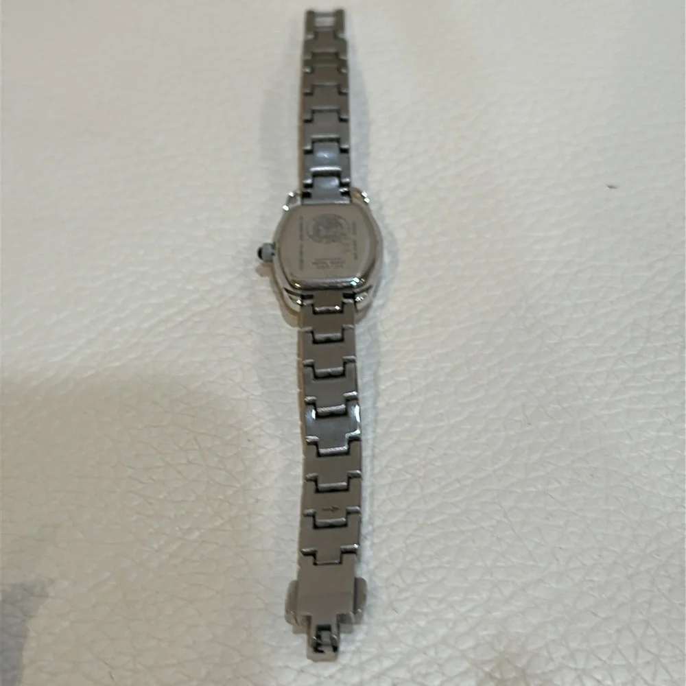 Citizen Women’s Natural Diamond Rectangle Wristwatch Model code: EW5413-50A